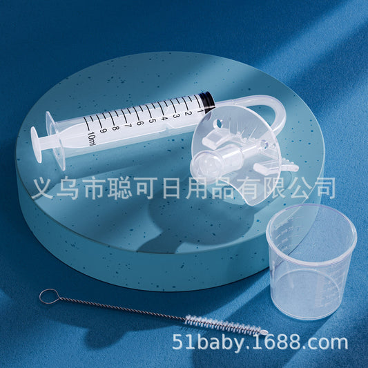 Distributeur de médicament pour bébé avec tétine